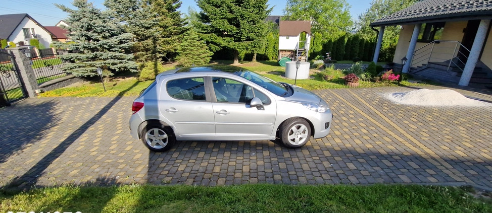 Peugeot 207 cena 16800 przebieg: 129107, rok produkcji 2010 z Bełchatów małe 407